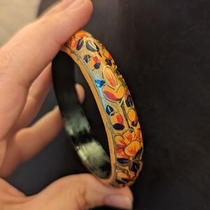 Handcrafted Orange Floral with Red and Blue Accents